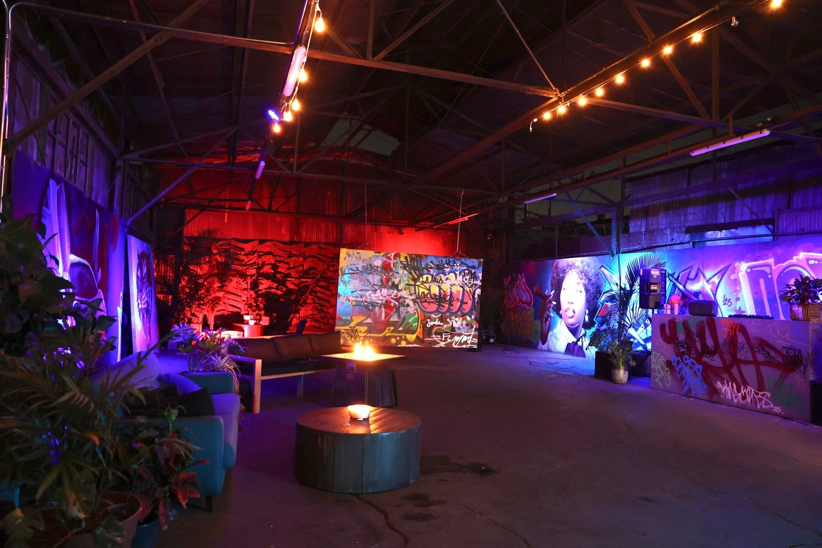 Graffiti walls and string lights at Complete Studio