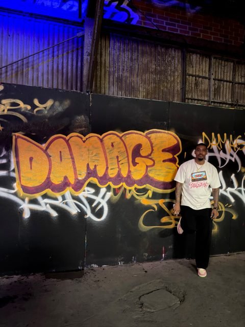 Workshop guest with gold graffiti lettering